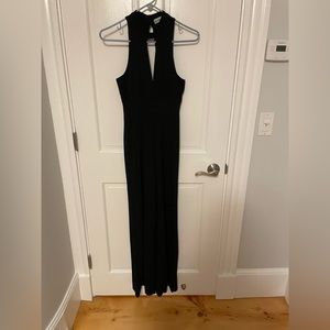 Black jumpsuit with high neck